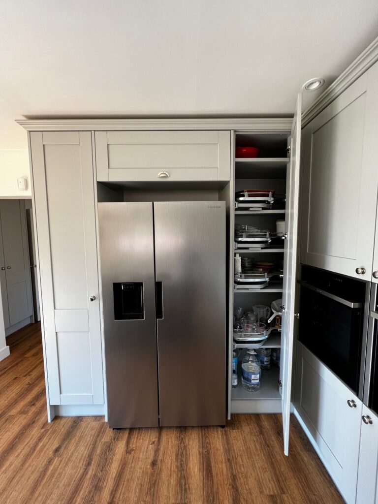 Light Grey Shaker Kitchen with Corner Tower Storage and American Fridge Freezer