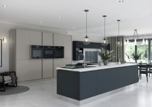 Modern open-plan kitchen featuring Crown Sapore HL cabinets in Pebble and Mercury finish, with integrated ovens, a large dark island, pendant lighting, and floor-to-ceiling windows.